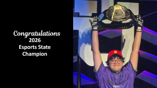  student holding championship belt 