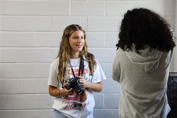 Smile, You Are on Camera To Demonstrate their understanding of camera basics Morgan photographs June. Yearbook students learn all the technical skills needed to capture the school’s most memorable moments, from mastering manual settings to finding the perfect lighting.